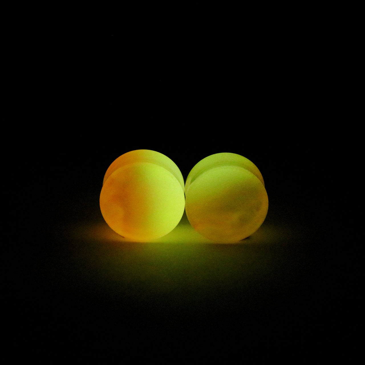 7/8" (22mm) Orange Glow Resin Plugs