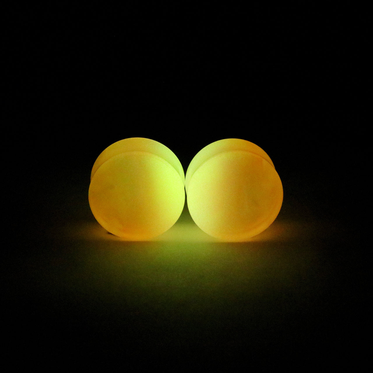 1" (25mm) Orange Glow Resin Plugs